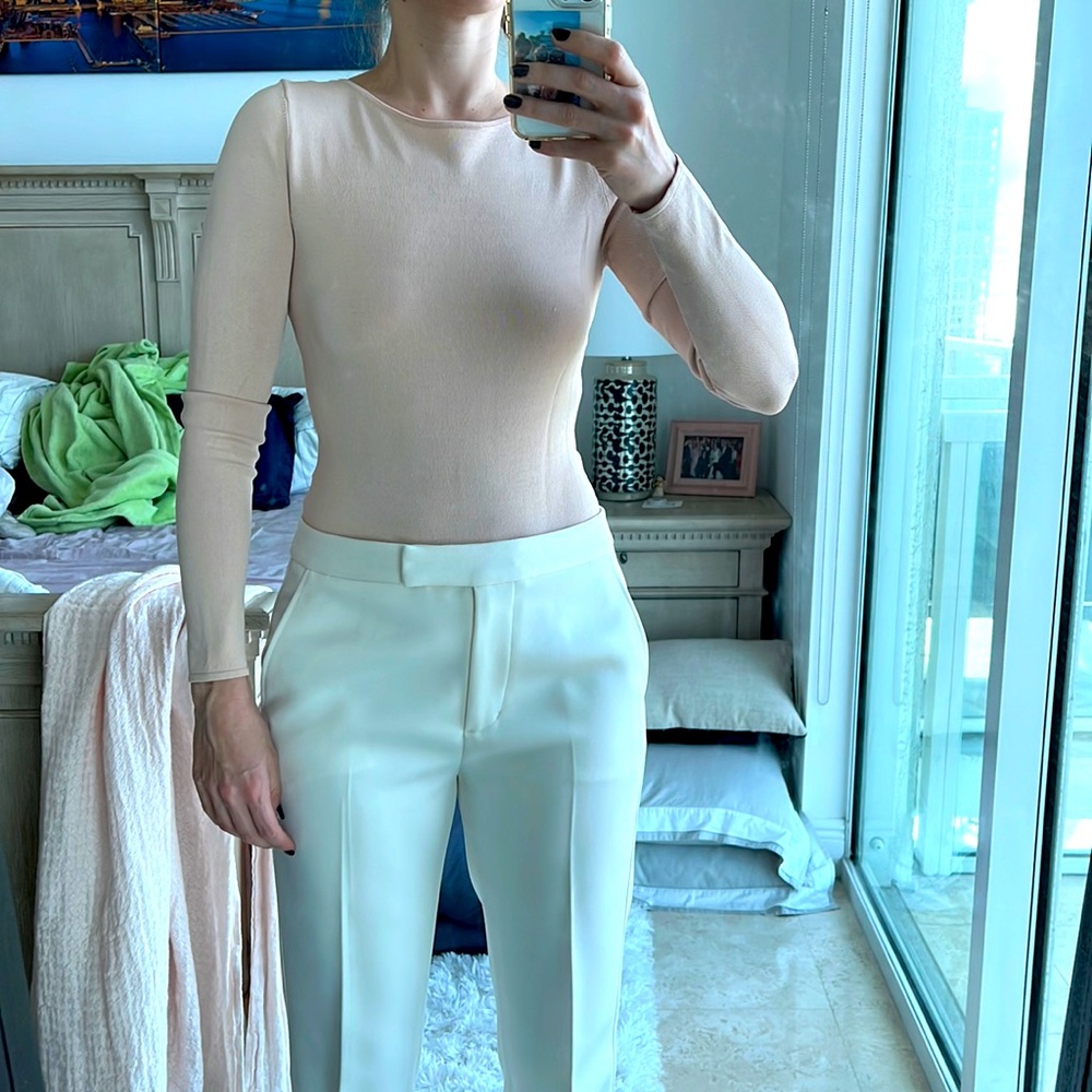 Intermix size small nude long sleeved thong bodysuit